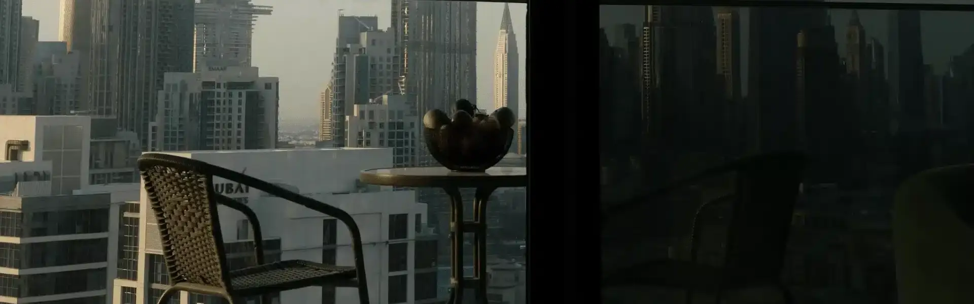 Balcony view of high-rise buildings in Dubai, a modern living in the UAE.