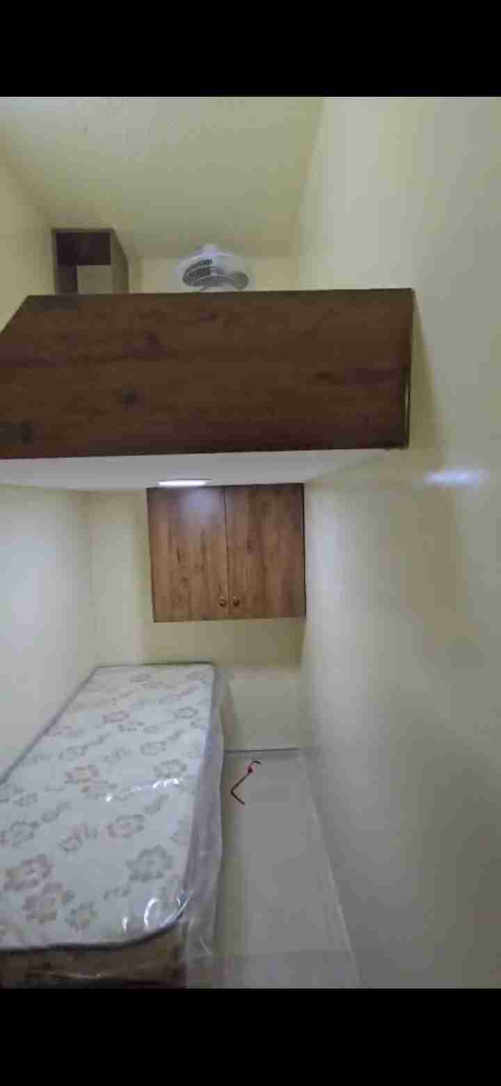 The Apartment & Amenities ​You will have full access to a fully equipped, "homey" kitchen and a spacious living area. We keep the home very tidy and organized. ​Kitchen: Includes a double-door fridge, microwave, oven, and dedicated cabinet space. ​Building Facilities: 24/7 Security & CCTV, Rooftop Swimming Pool, and a fully equipped Gym. ​Laundry: Automatic washing machine and drying area available.